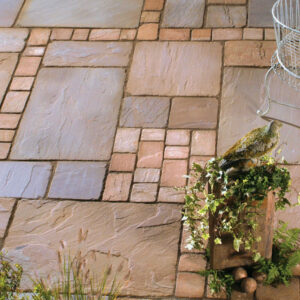 FOSSIL BUFF TUMBLED COBBLES